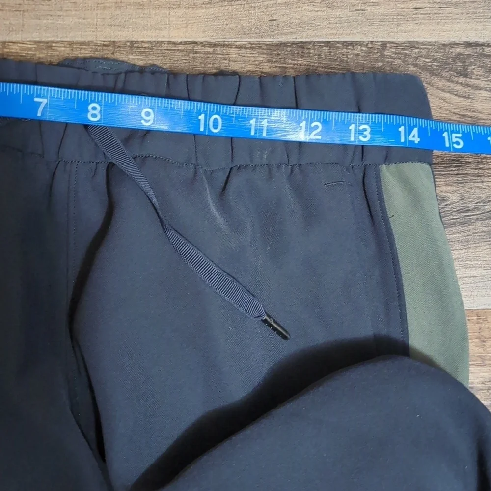 Lululemon On The Fly Pant Woven *Track Stripe Black / Dark Olive | 14 - Picture 11 of 12